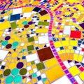 From above abstract pattern of colorful mosaic tiles arranged on floor as background